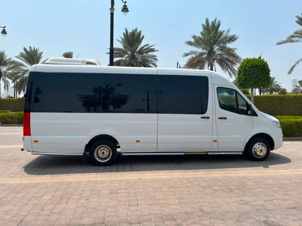Mercedes Sprinter rental Dubai side view for corporate and airport transfers